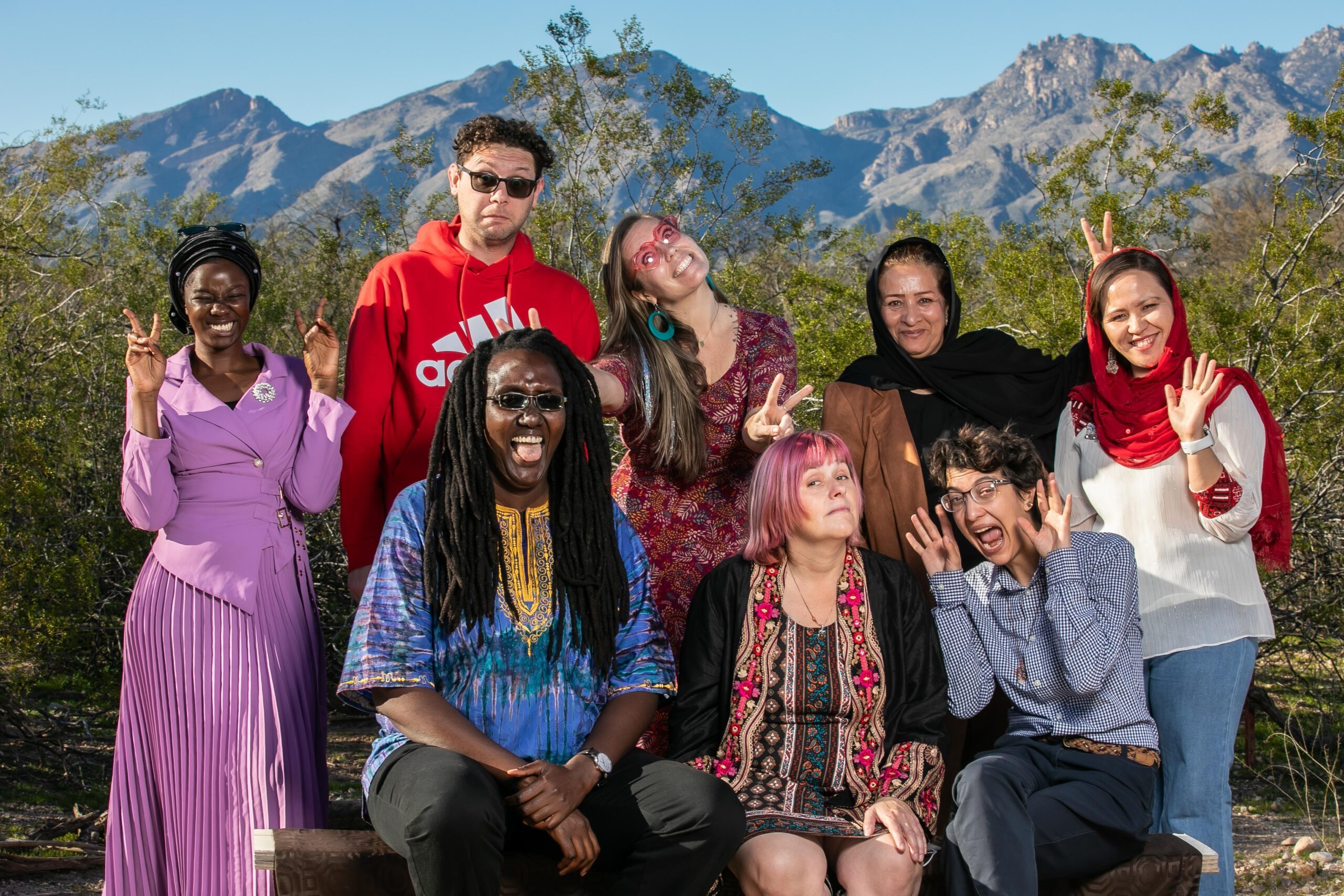 Portrait of Owl and Panther staff. Owl and Panther is a Tucson-based non-profit organization that provides resources and services to refugee families. Image by Kathleen Dreier Photography.