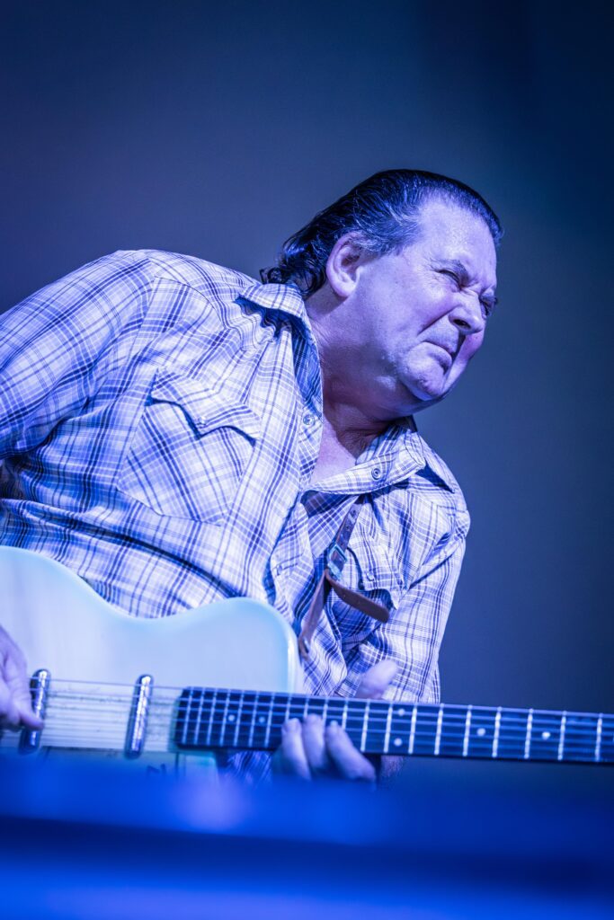 A musician from the Arizona Blues Hall of Fame gives the audience his all during KXCI's House Rockin Blues Concert at the El Casino Ballroom. Image by Kathleen Dreier Photography.