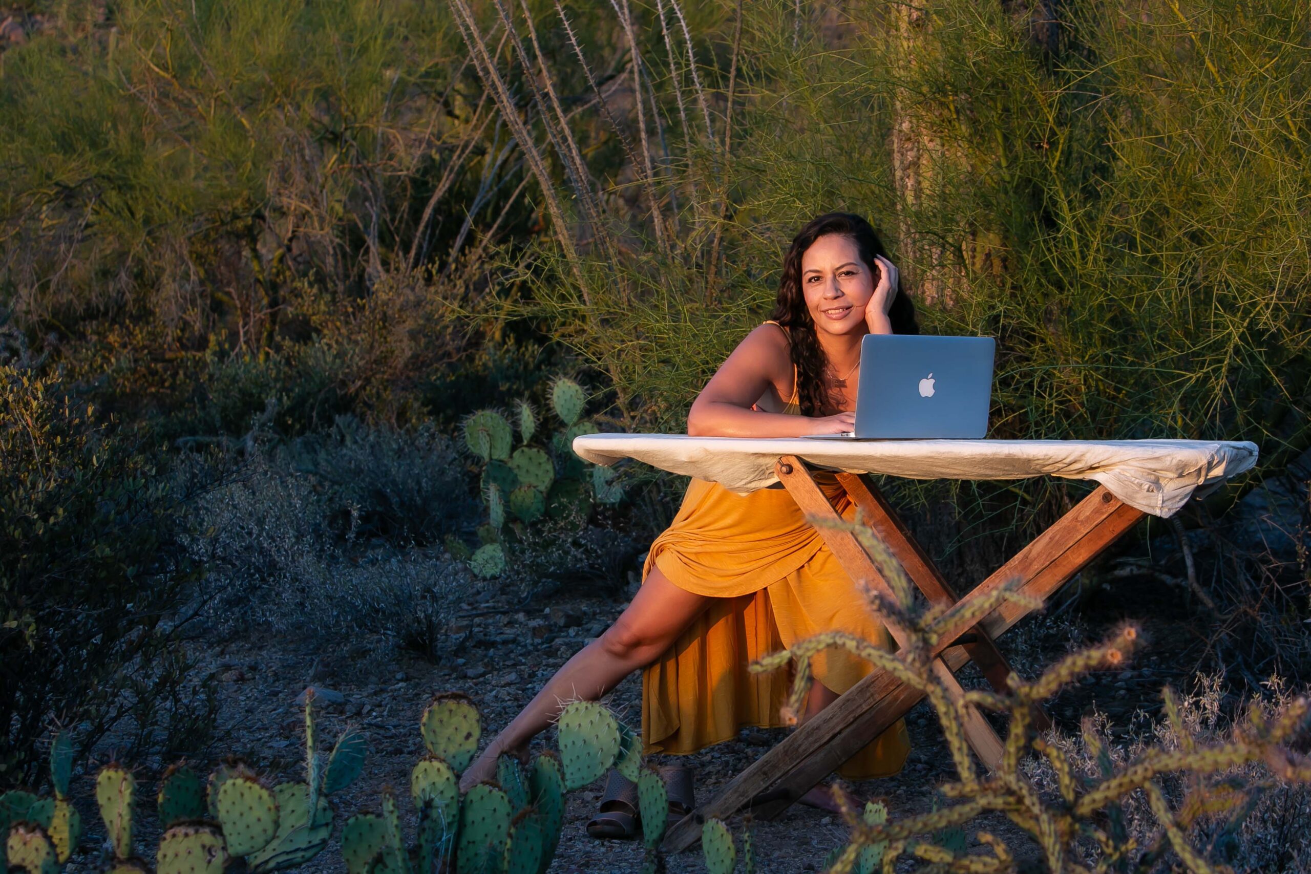 Milta Ortiz, a playwright, performer, dancer, mother and wife, asked for a unique portrait session in the Tucson desert that symbolizes the multi-tasking life she leads. She and her husband are the founders of Borderlands Theater. Image © Kathleen Dreier Photography was included in a published Local First Arizona 2024 article.